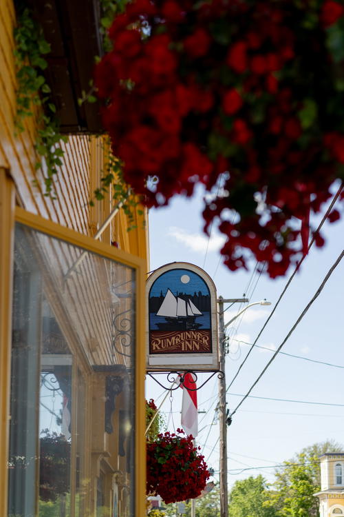 A sign of the outside of Rumrunner Inn, in Lunenburg, Canada.