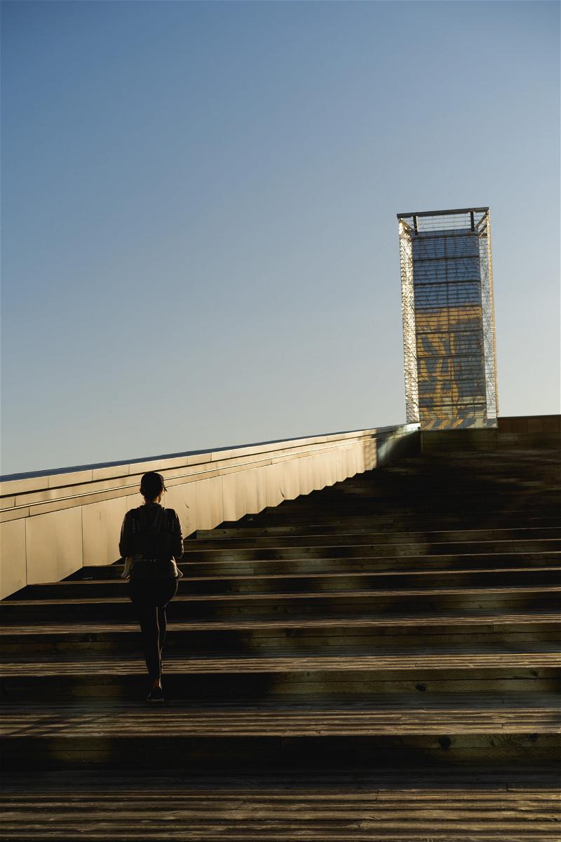 A man descending stairs in Halifax, Canada.