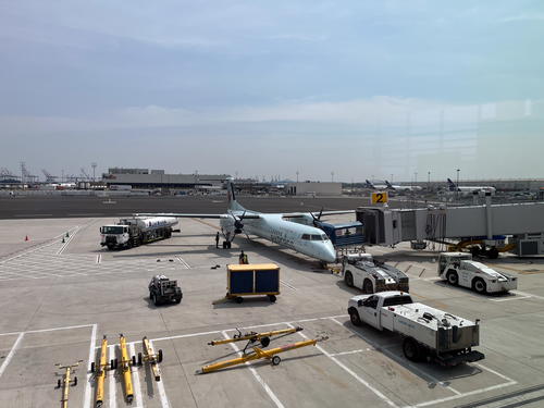 A plane is parked on the tarmac at Halifax Airport in Canada.