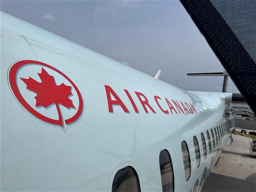 A Halifax-based airliner proudly displaying the Canadian flag on its side.