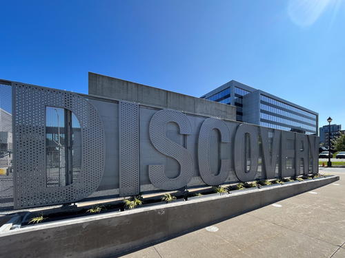 A discovery sign in front of a building located in Halifax, Canada.