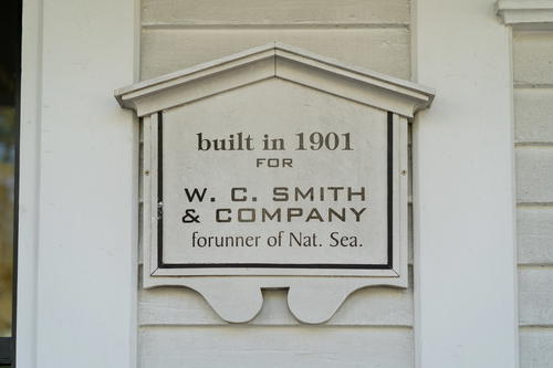 A sign that is on the side of a building