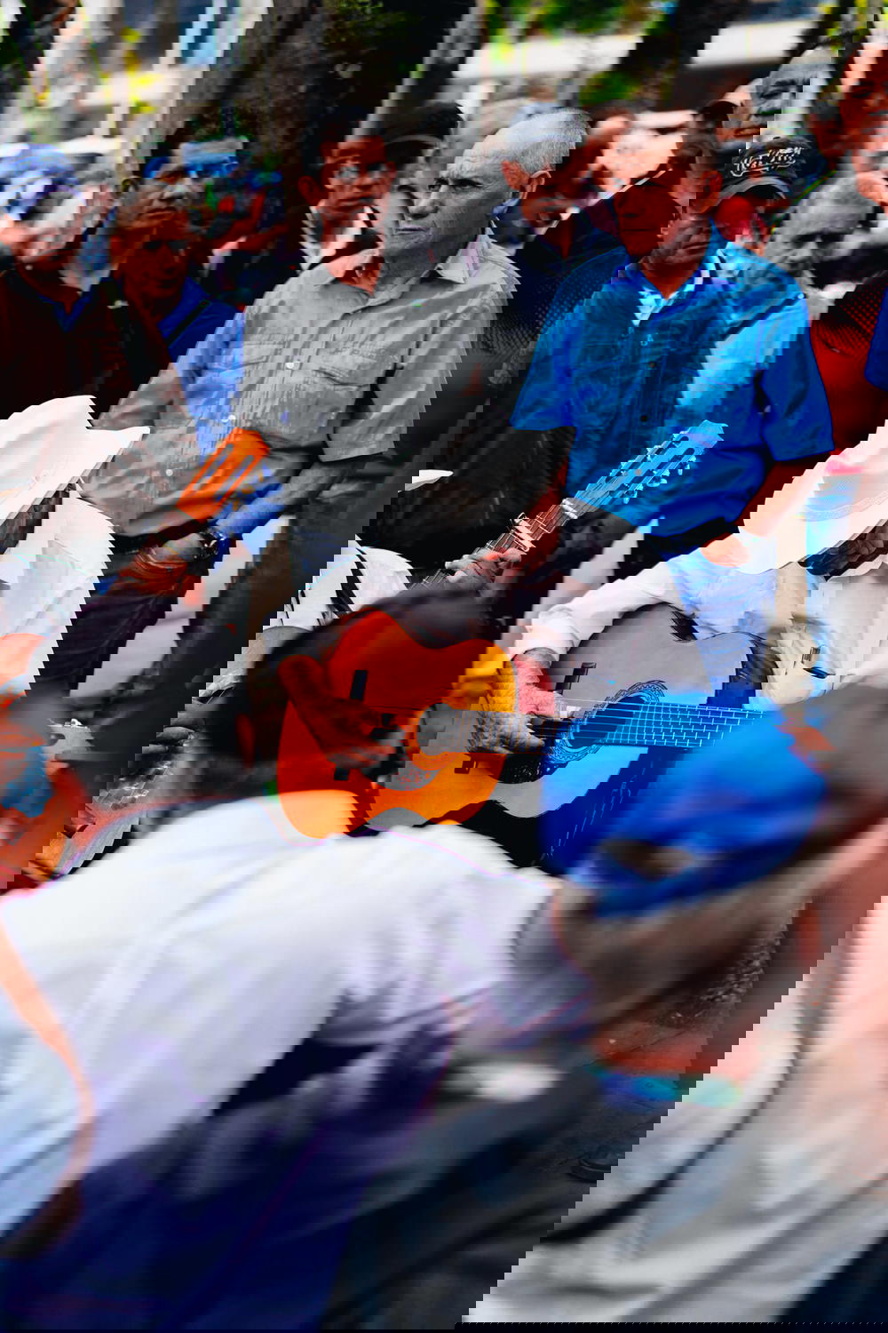 A man playing guitar.