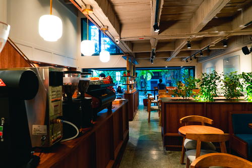Pergamino cafe new wooden interior in Medellin, Colombia