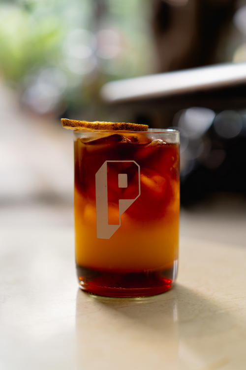 a close up of a drink on a table