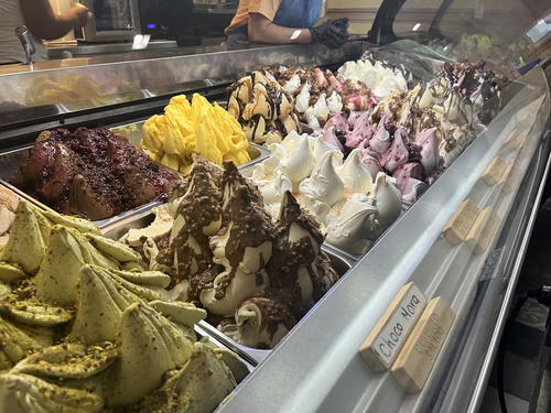a display of ice cream and chocolates in a store