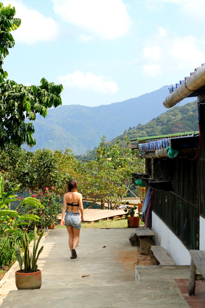 A woman walking down a path.