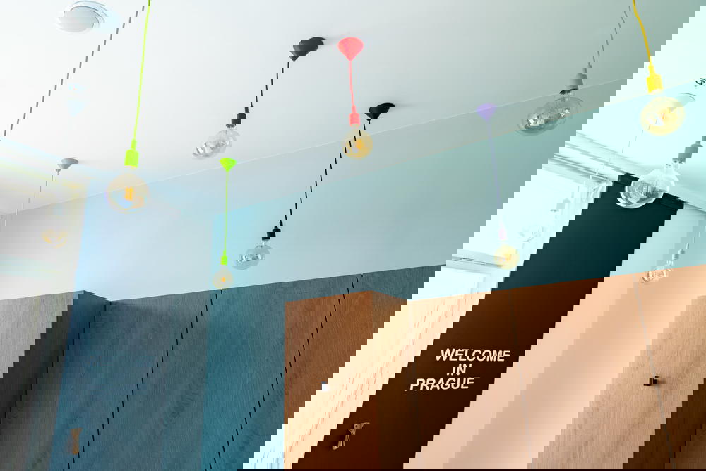 Lights hanging from the ceiling in a Meetme23 room interior