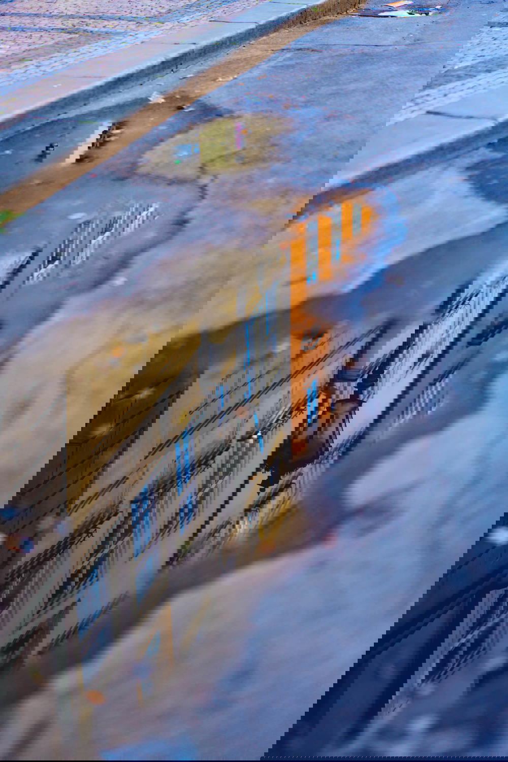 Reflection in water of Prague Old Town buildings