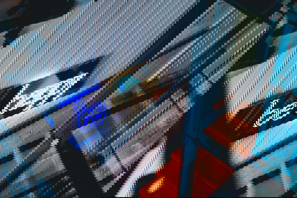 Neon signage at MeetMe23 in Prague