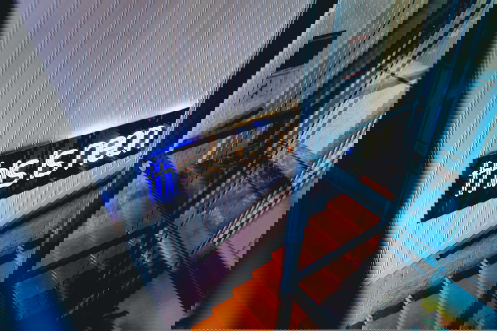 Neon signage at MeetMe23 in Prague