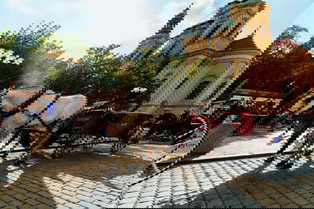 A horse-drawn carriage in Prague's Old Town Square