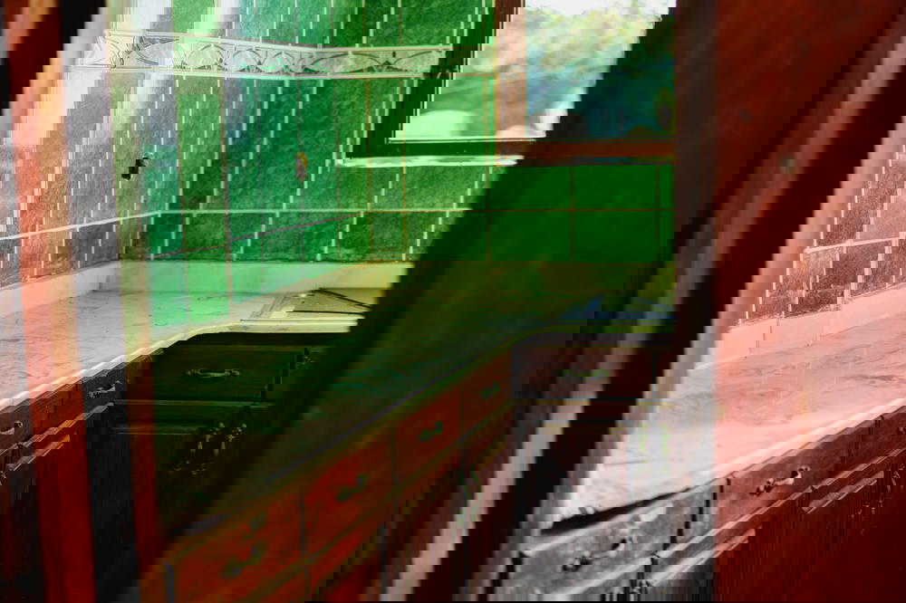 Haunted kitchen falling apart due to being exposed to natural elements through the years