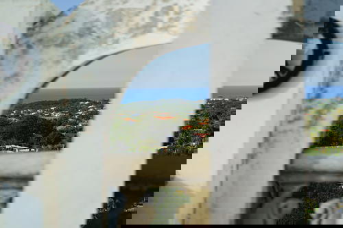 A view of a city through a window.