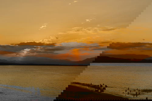 Sunset viewed from west facing beach at Playa Alicia in Sosua Dominican Republic