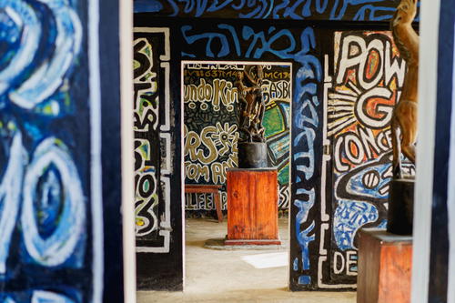 A room with graffiti on the walls.