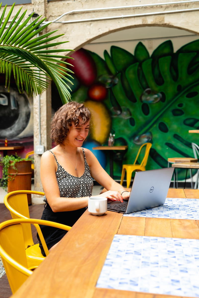 A woman sitting at a table.