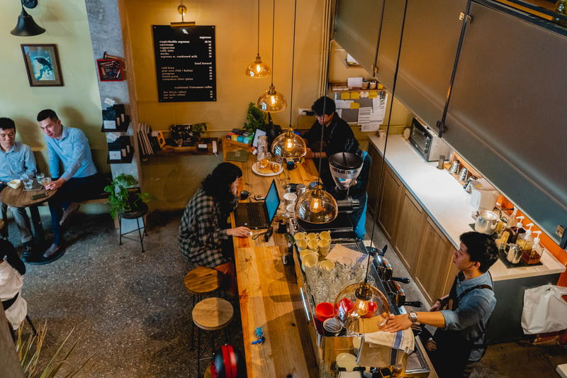 Baristas making coffee at Blackbird Coffee Hanoi Vietnam best cafes coffee shops for working