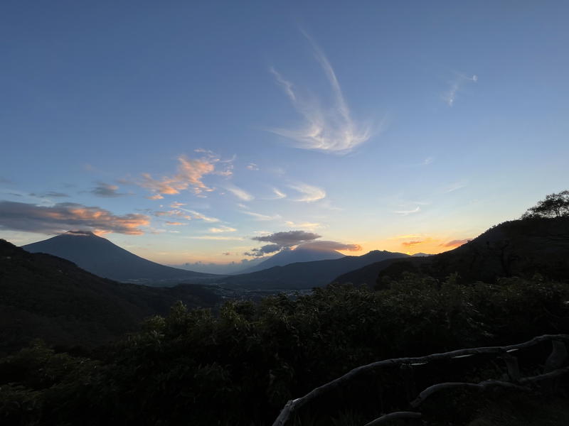 The sun is setting over a mountain in Guatemala.