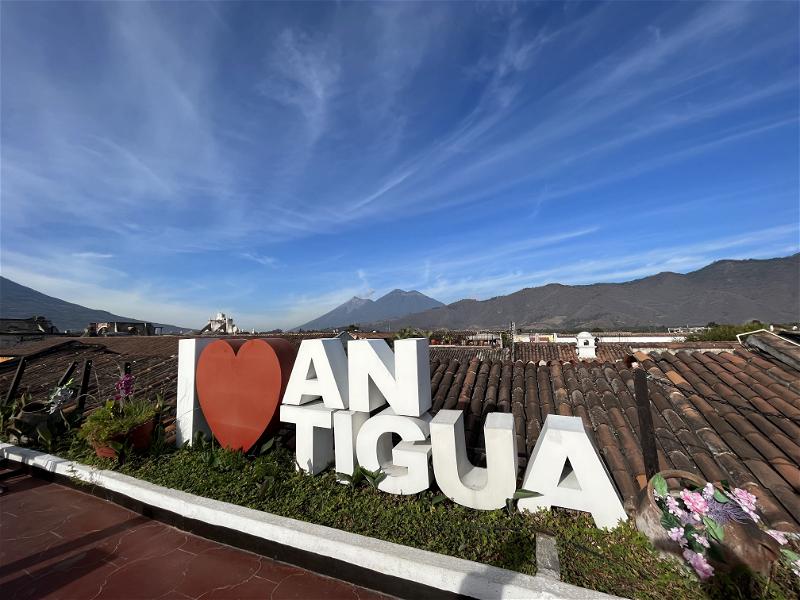 A rooftop sign expressing love for Antigua, Guatemala.
