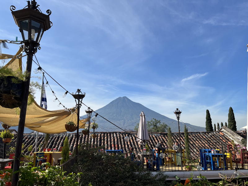 A mountain-framed restaurant view in Guatemala.