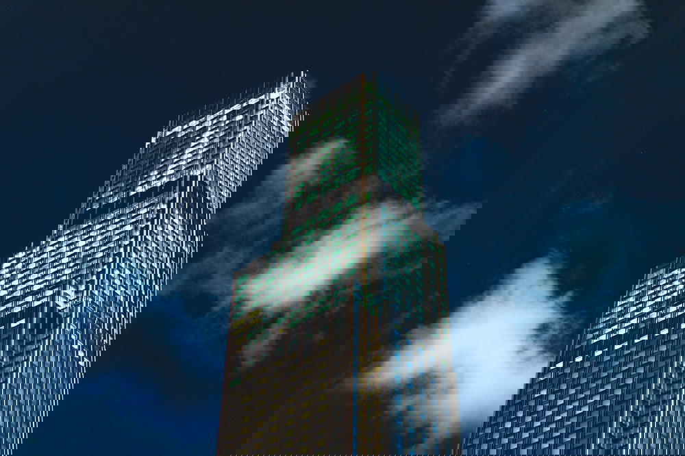 Tall building at night in Hong Kong