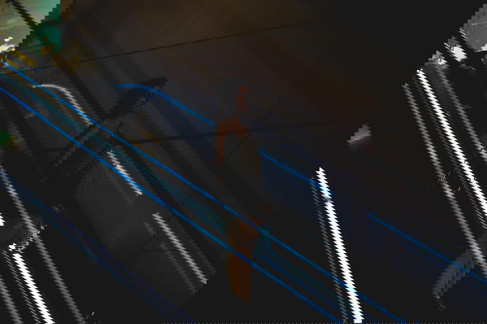 Girl going down an escalator