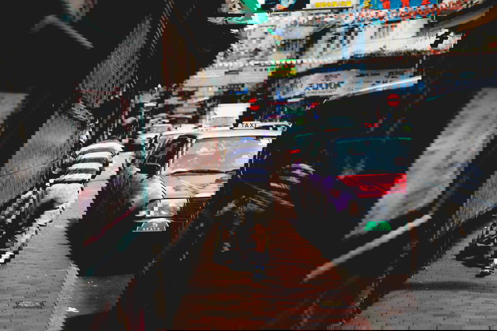 Man walking down the street in Hong Kong