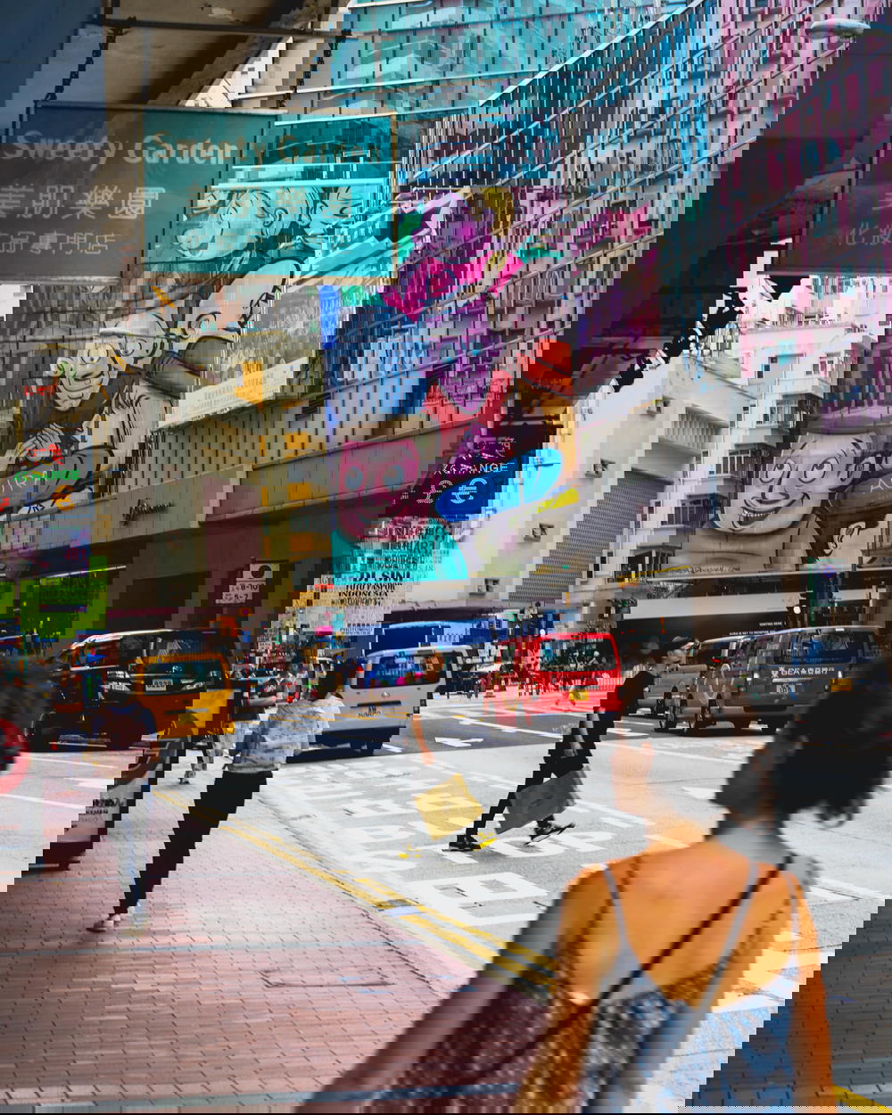 Girl walking down the street in Hong Kong