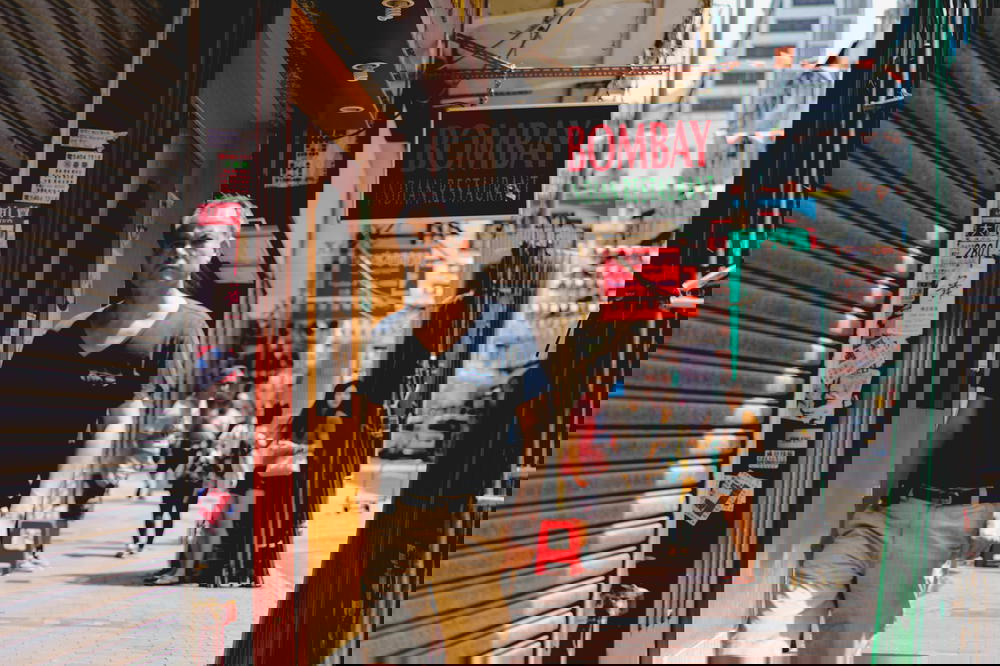 Blurry man walking down the street