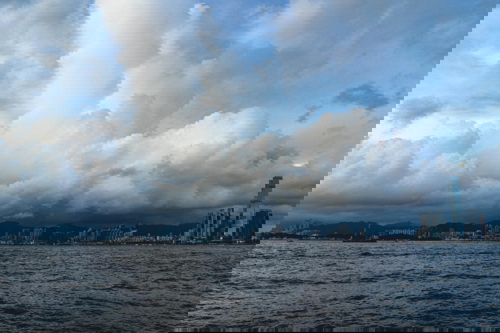 A cloudy sky over a body of water in Hong Kong.