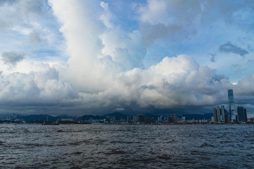 A cloudy sky over a body of water in Hong Kong.