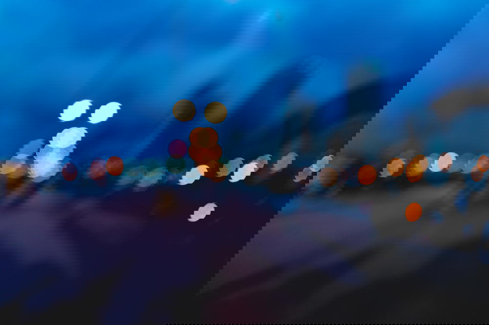 A blurry image of Hong Kong at night.