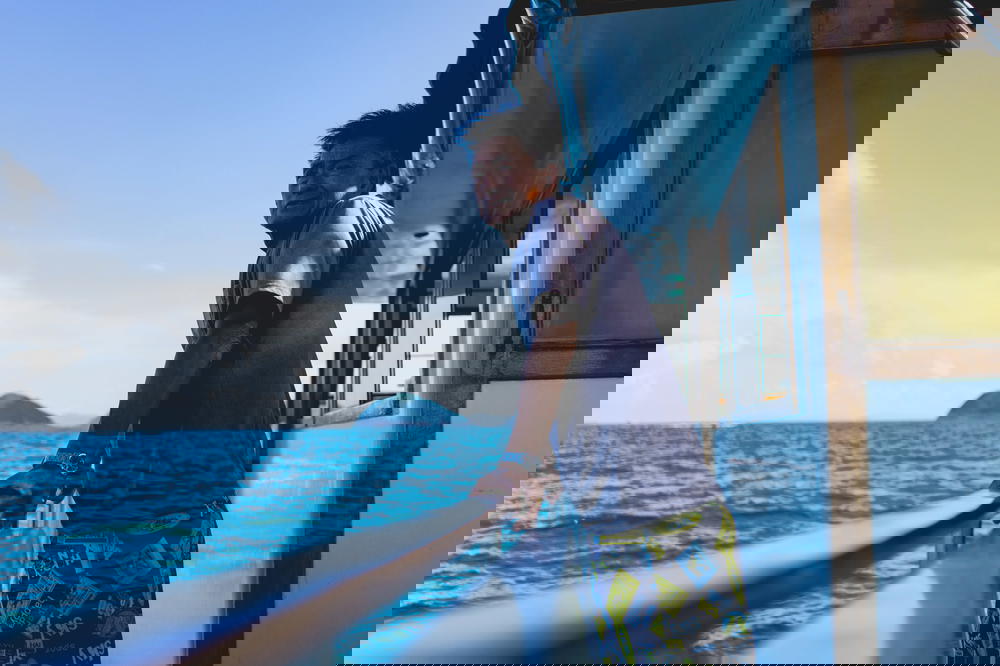 Man looking out at the ocean