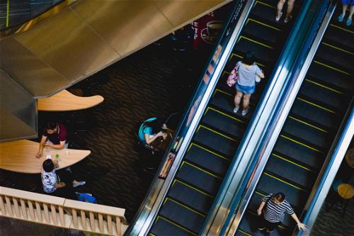 A group of people on a Hong Kong escalator.