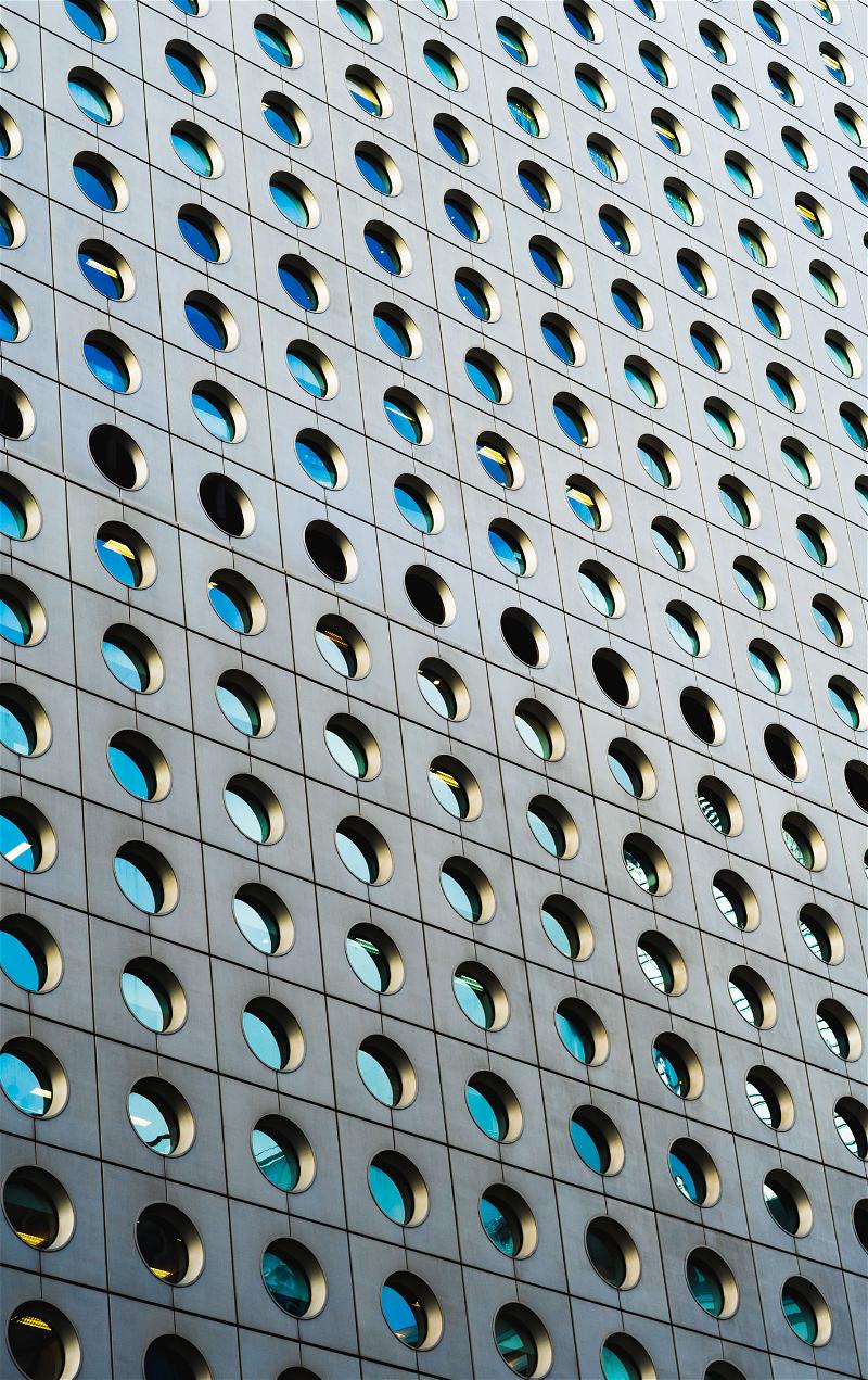 A Hong Kong building riddled with holes.
