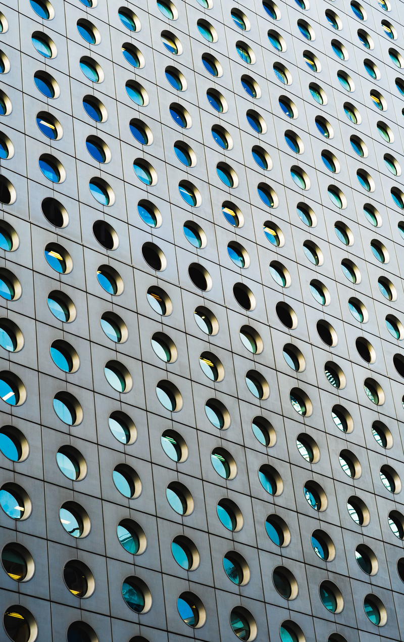 A Hong Kong building riddled with holes.