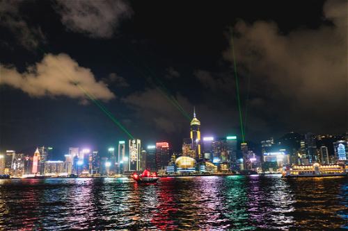Hong Kong cityscape illuminated at night.