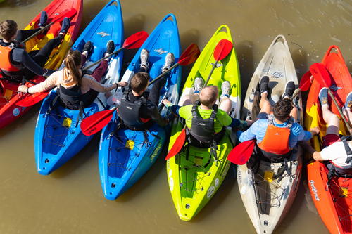 A group of kayakers exploring the Wild Atlantic Way in Ireland.