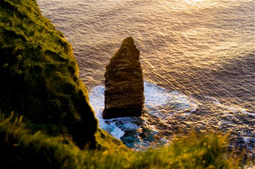 A Wild Atlantic Way cliff in Ireland with ocean views.