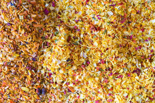 A pile of dried flowers from Israel on a table.