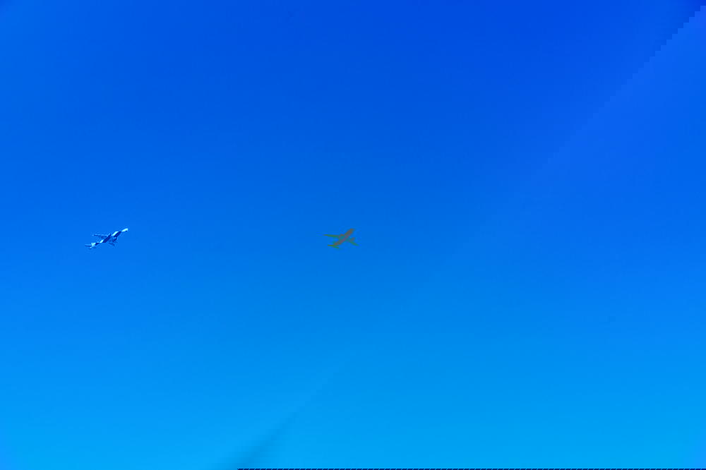 Airplane flying over blue sky in tel aviv israel