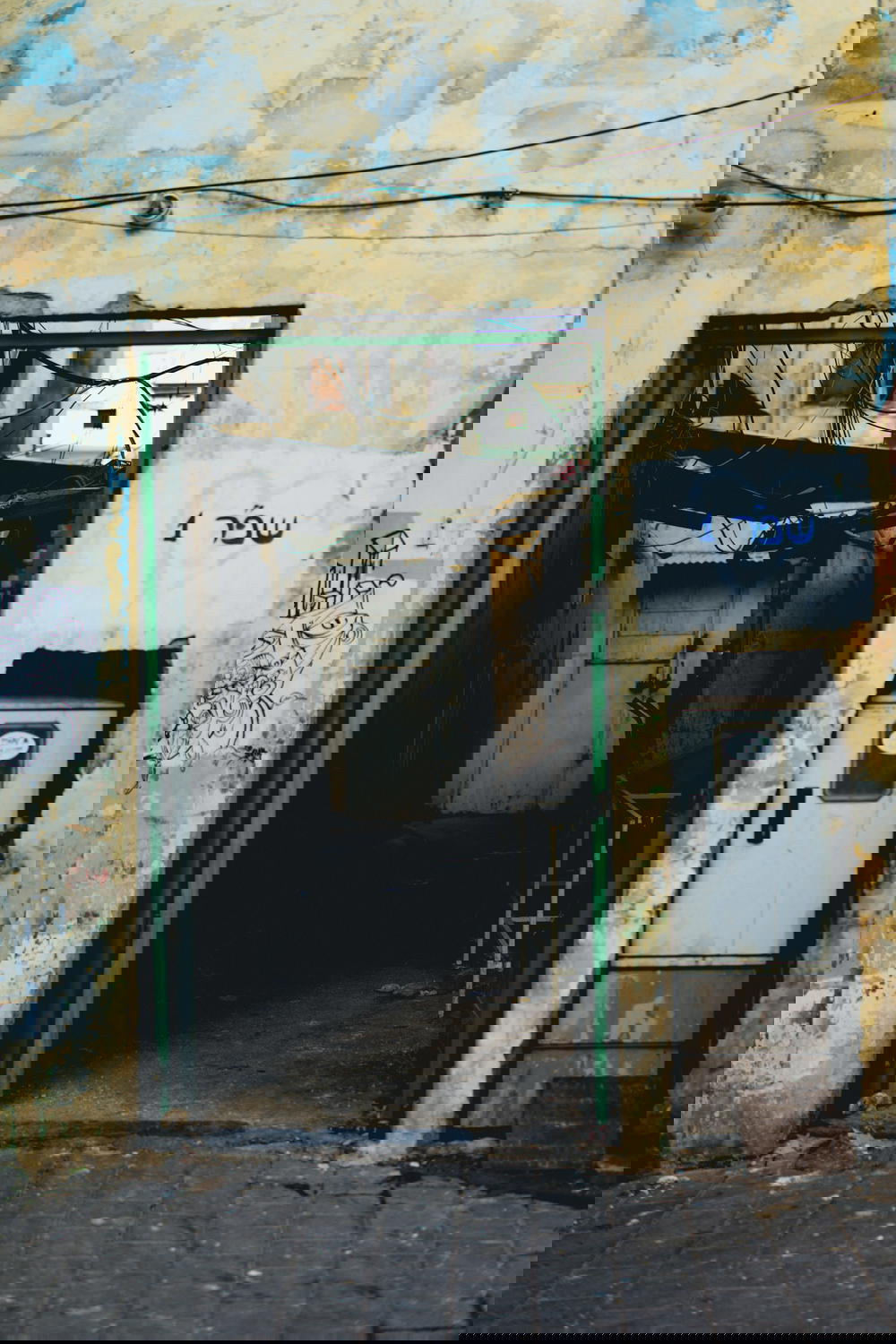 A building in Israel with graffiti on it.