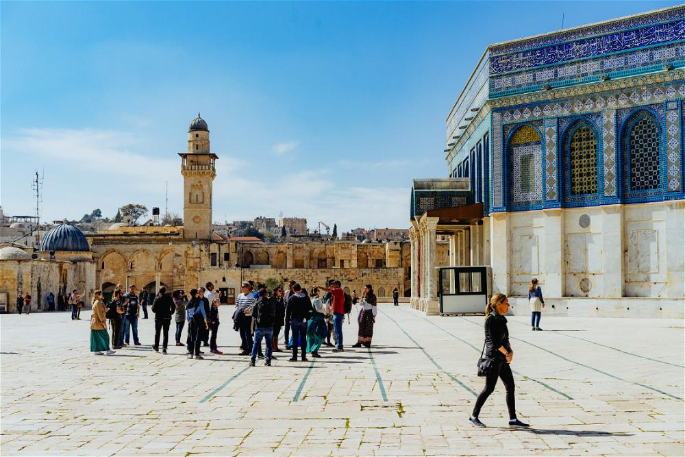 Tour group traveling to visit the Dome of the Rock in Jerusalem Israel