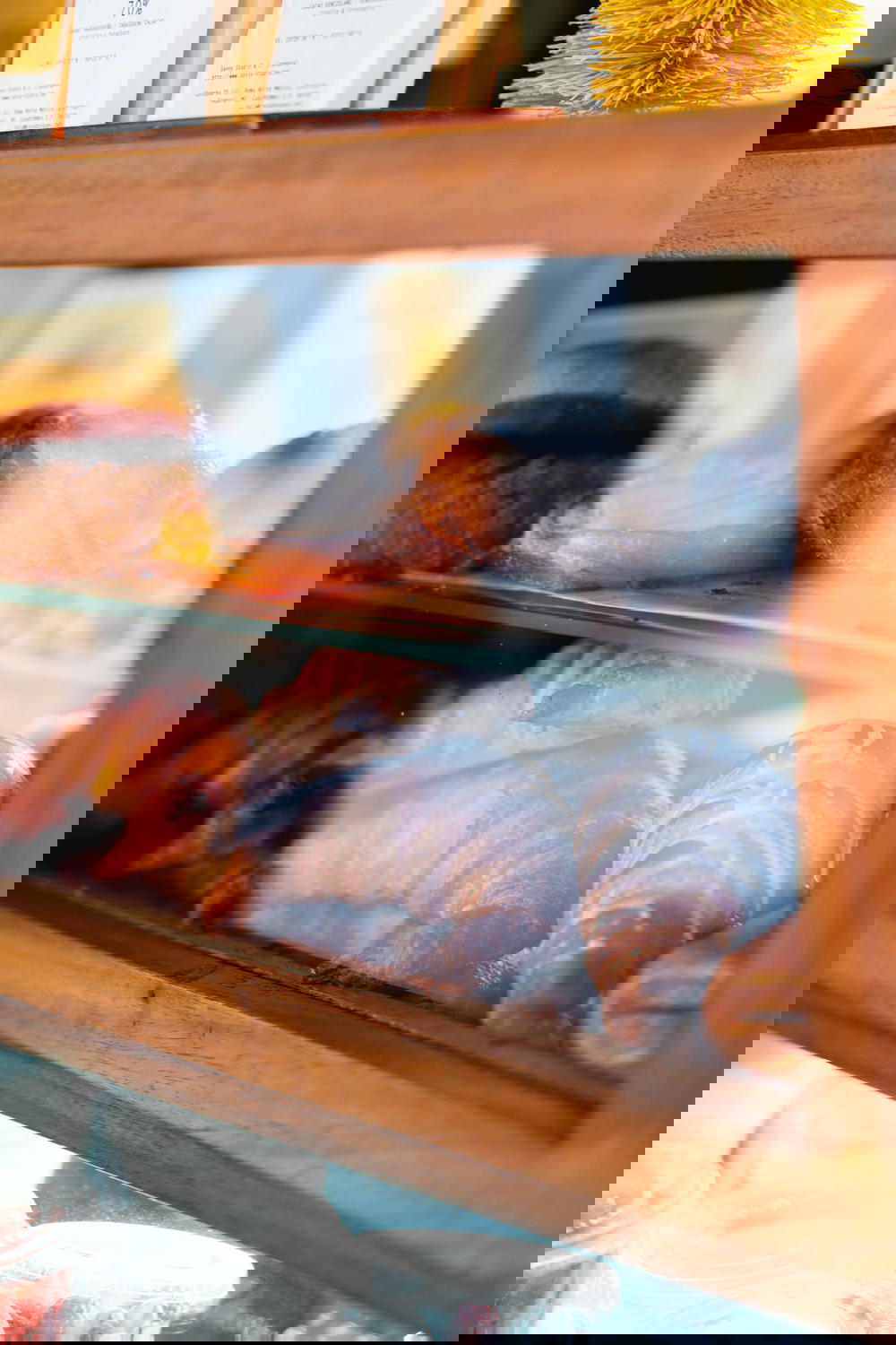 A display case of Mexican pastries in a bakery.