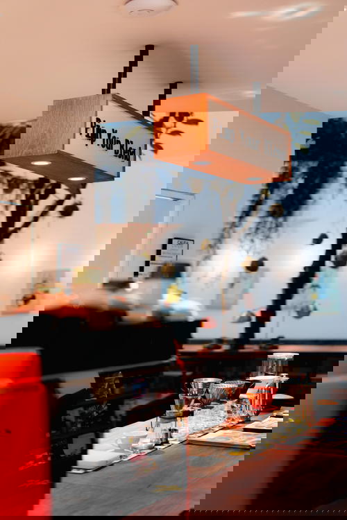 Sign in a coffee shop that says Pimp Your Blend