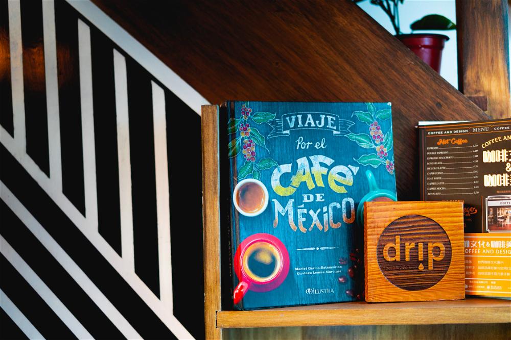 A Mexican coffee table with books on it.