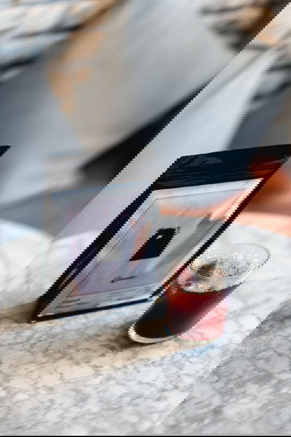 A cup of freshly brewed Mexican coffee sitting on a wooden table.