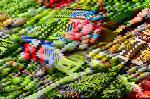 A variety of fruits and vegetables from Mexico are on display at a market.
