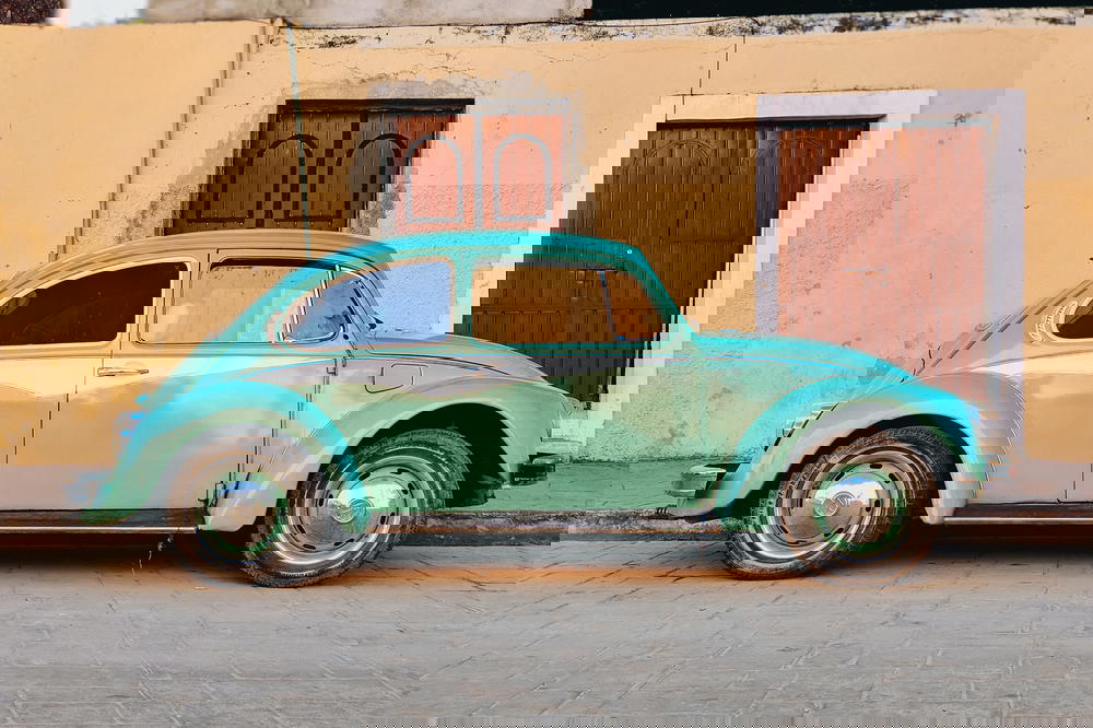 Teal (or light green) 1970s style Volkswagen Beetle